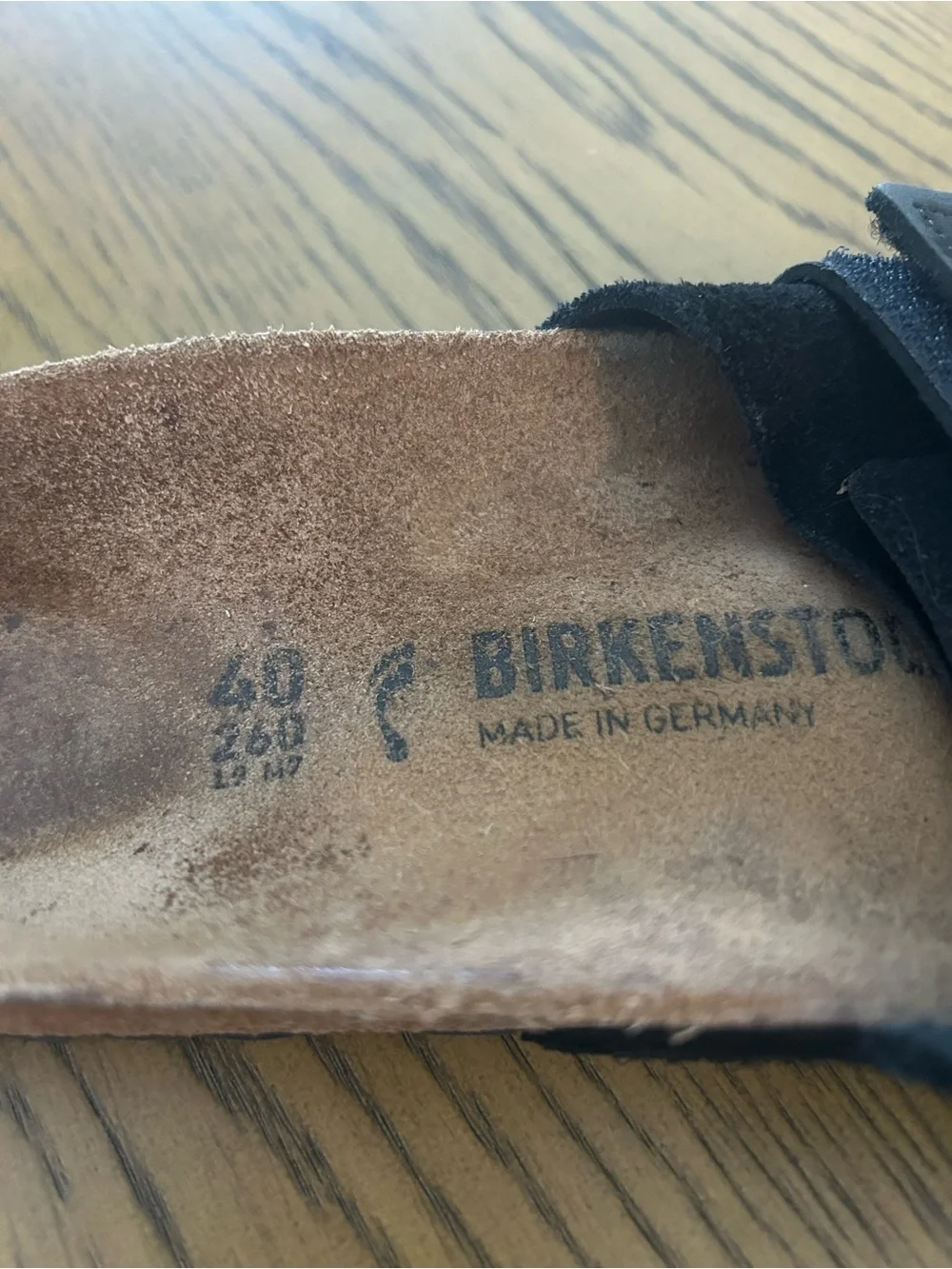 Birkenstock black slide sandals.